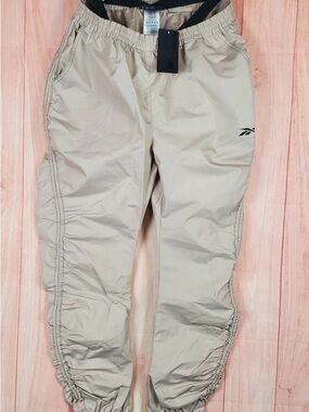 Cardi B x Reebok Beige Windbreaker Joggers with Elastic Ankles